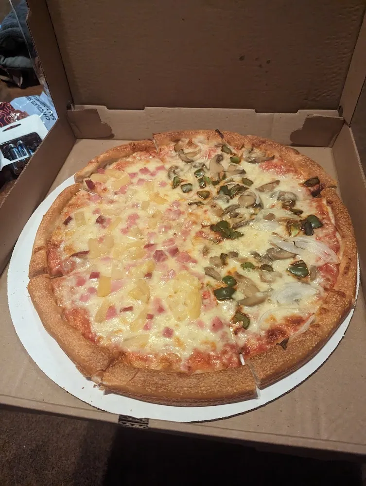 Half Hawaiian & Onion Peppers and Mushrooms Pizza